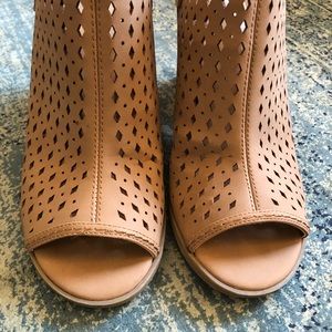 Peep toe buckle bootie